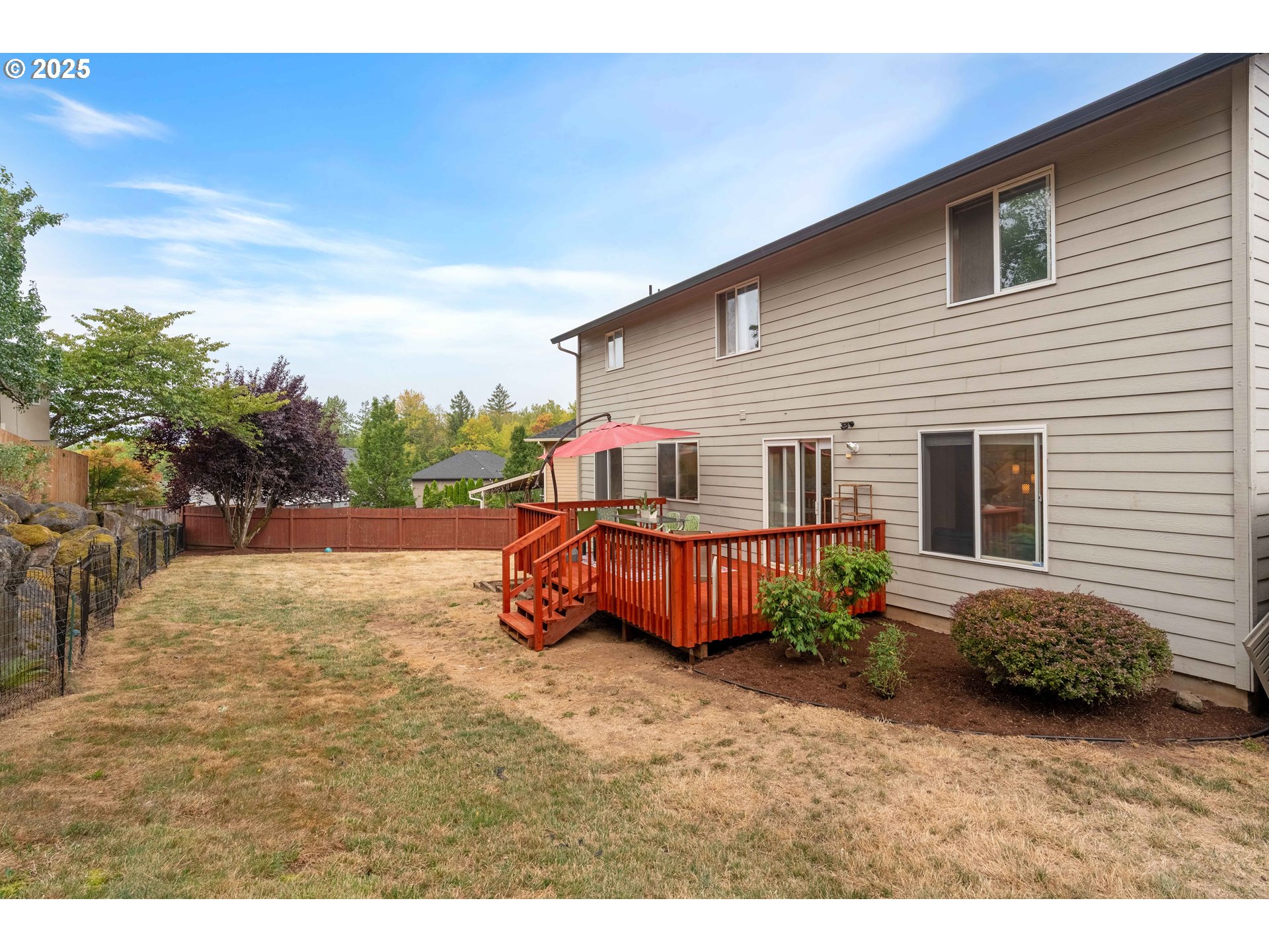 4043 Southeast Harmony Place Camas, WA 98607 - Photo 34 of 40 a view of backyard of the house