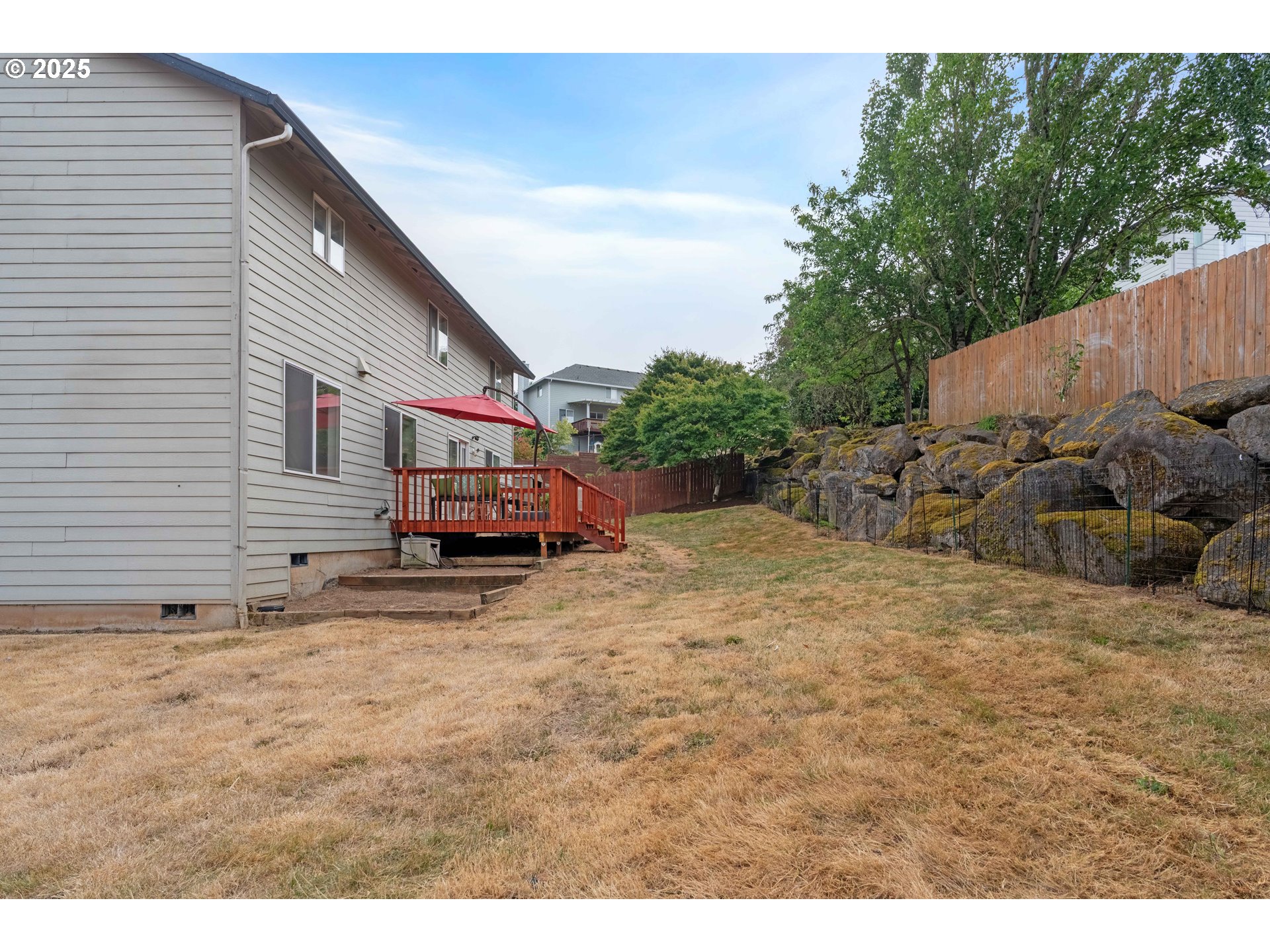 4043 Southeast Harmony Place Camas, WA 98607 - Photo 35 of 40 a house view with a backyard space