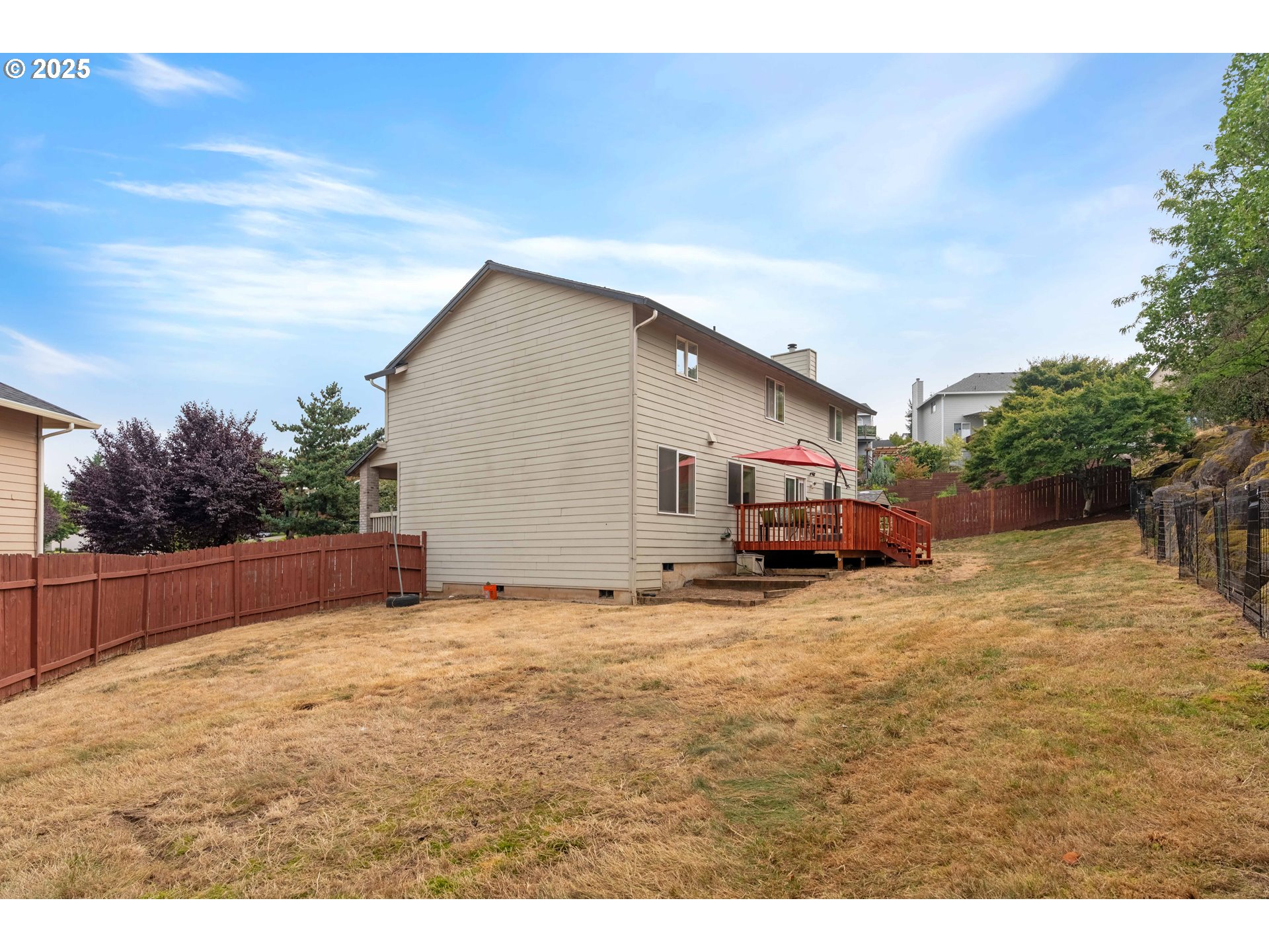 4043 Southeast Harmony Place Camas, WA 98607 - Photo 36 of 40 a view of a house with a patio