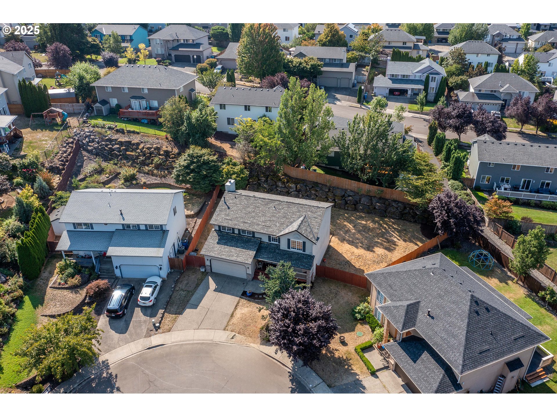 4043 Southeast Harmony Place Camas, WA 98607 - Photo 38 of 40 an aerial view of residential houses with outdoor space