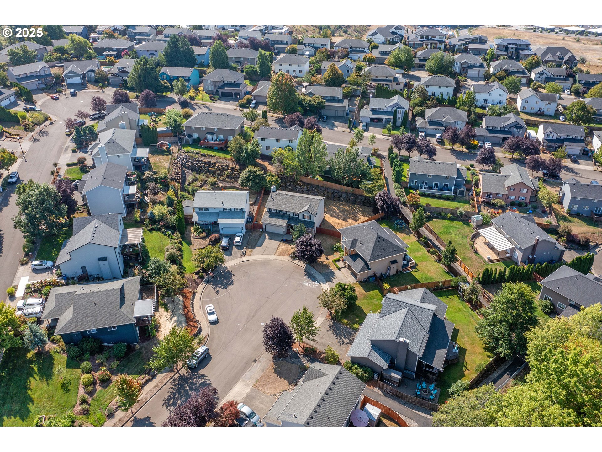 4043 Southeast Harmony Place Camas, WA 98607 - Photo 40 of 40 an aerial view of a house with a lake view