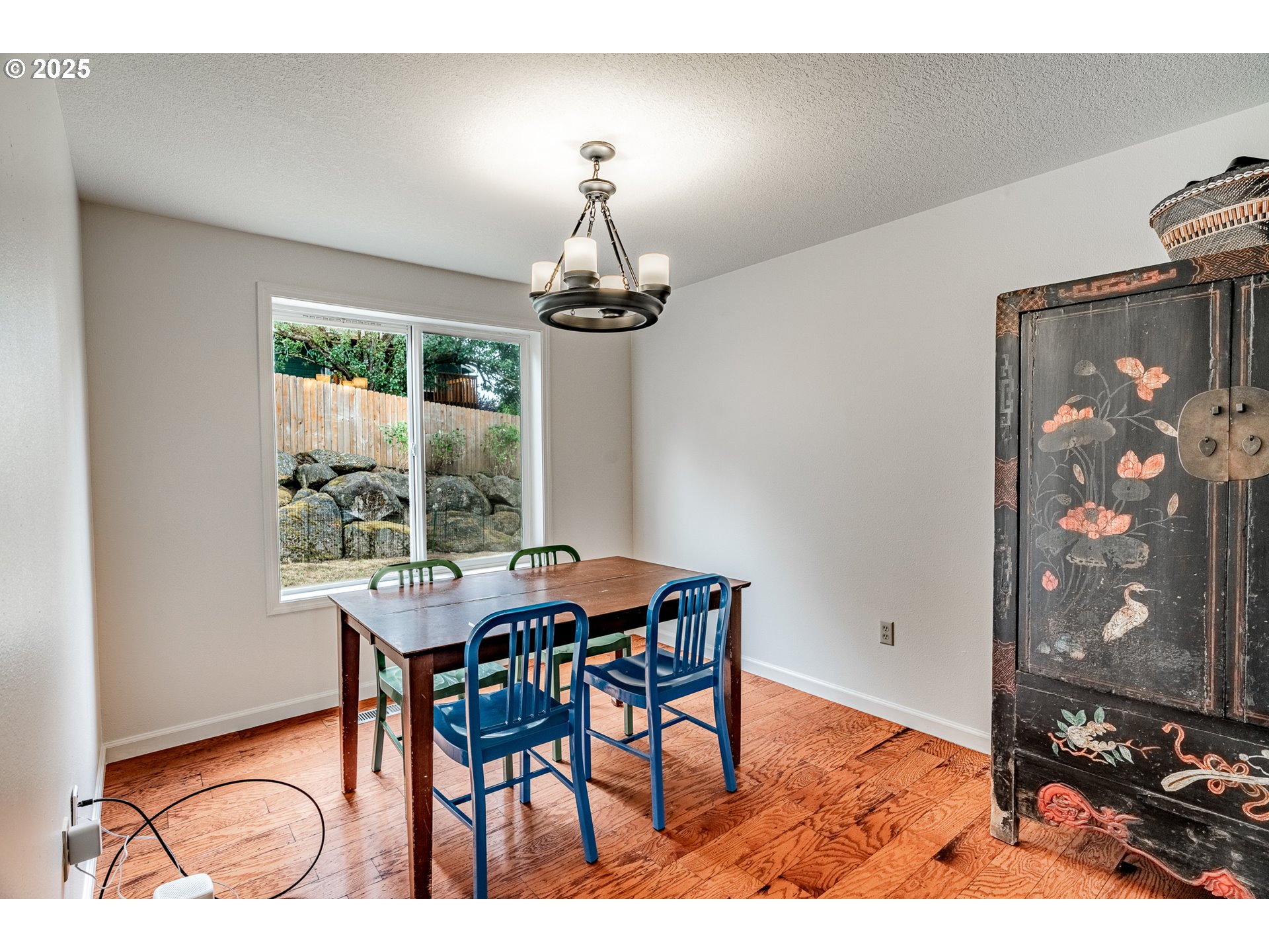 4043 Southeast Harmony Place Camas, WA 98607 - Photo 8 of 40 a view of a dining room with furniture window and wooden floor