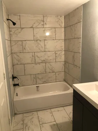 a bathroom with a bathtub