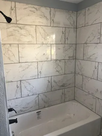 a bathroom with a bathtub