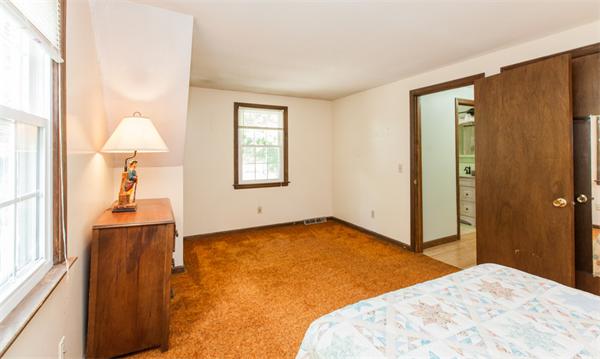 224 Munn Road Monson, MA 01057 - Photo 23 of 30 a bedroom with a bed and a window