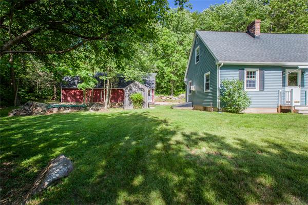 224 Munn Road Monson, MA 01057 - Photo 4 of 30 a view of a house with a yard and sitting area