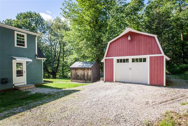 224 Munn Road Monson, MA 01057 - Photo 8 of 30 a backyard of a house with yard and trampoline