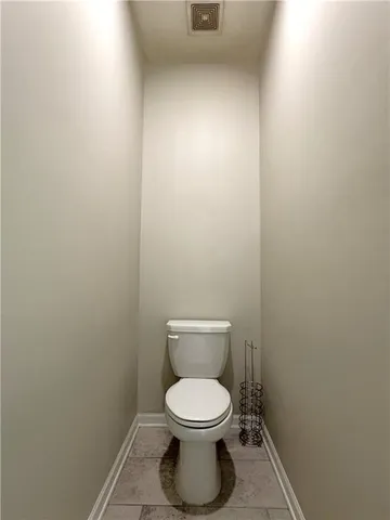 a bathroom with a toilet
