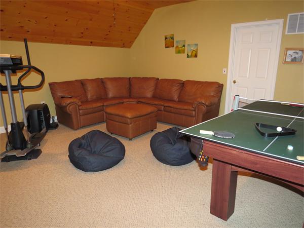14 Corn Road Bolton, MA 01740 - Photo 13 of 22 a living room with furniture and a air conditioner vent