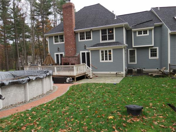 14 Corn Road Bolton, MA 01740 - Photo 20 of 22 a view of a house with patio