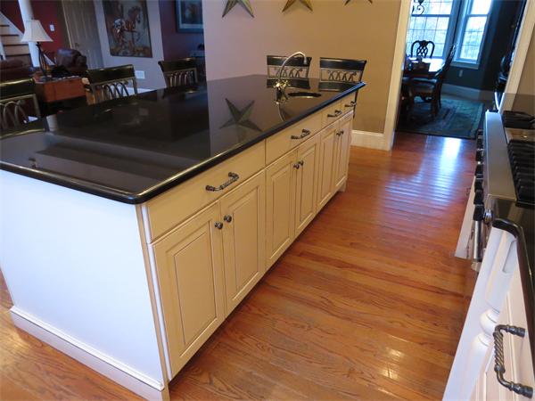 14 Corn Road Bolton, MA 01740 - Photo 6 of 22 a kitchen with sink and cabinets