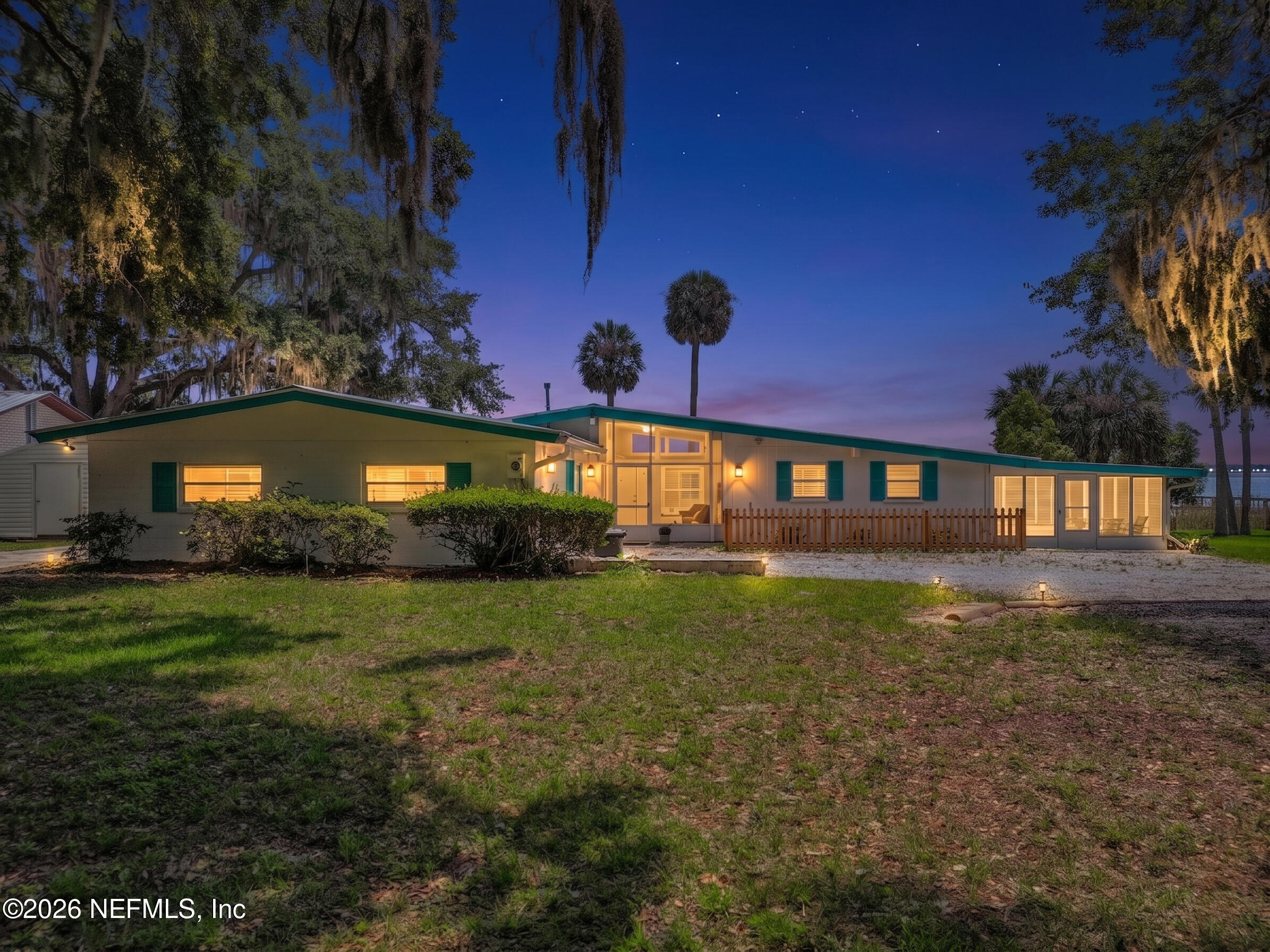 126 Pique Road Crescent City, FL 32112 - Photo 1 of 59 a view of a house with a big yard