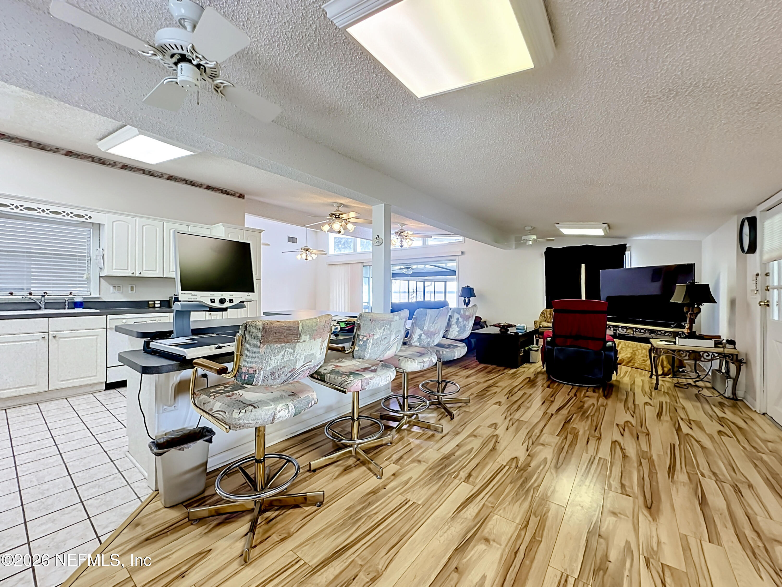 126 Pique Road Crescent City, FL 32112 - Photo 20 of 59 a living room with furniture and a flat screen tv