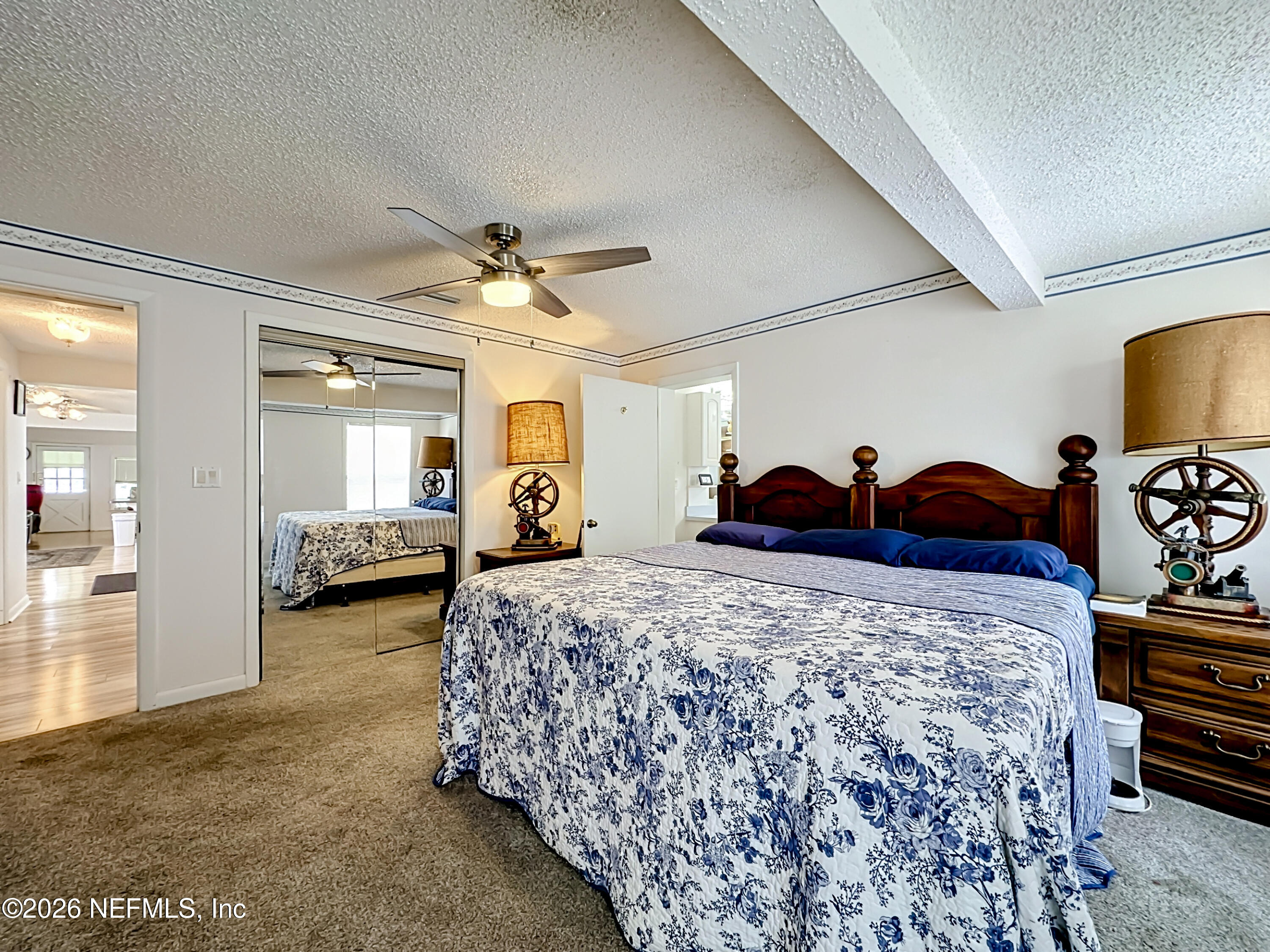 126 Pique Road Crescent City, FL 32112 - Photo 24 of 59 a bed room with a bed and a tv