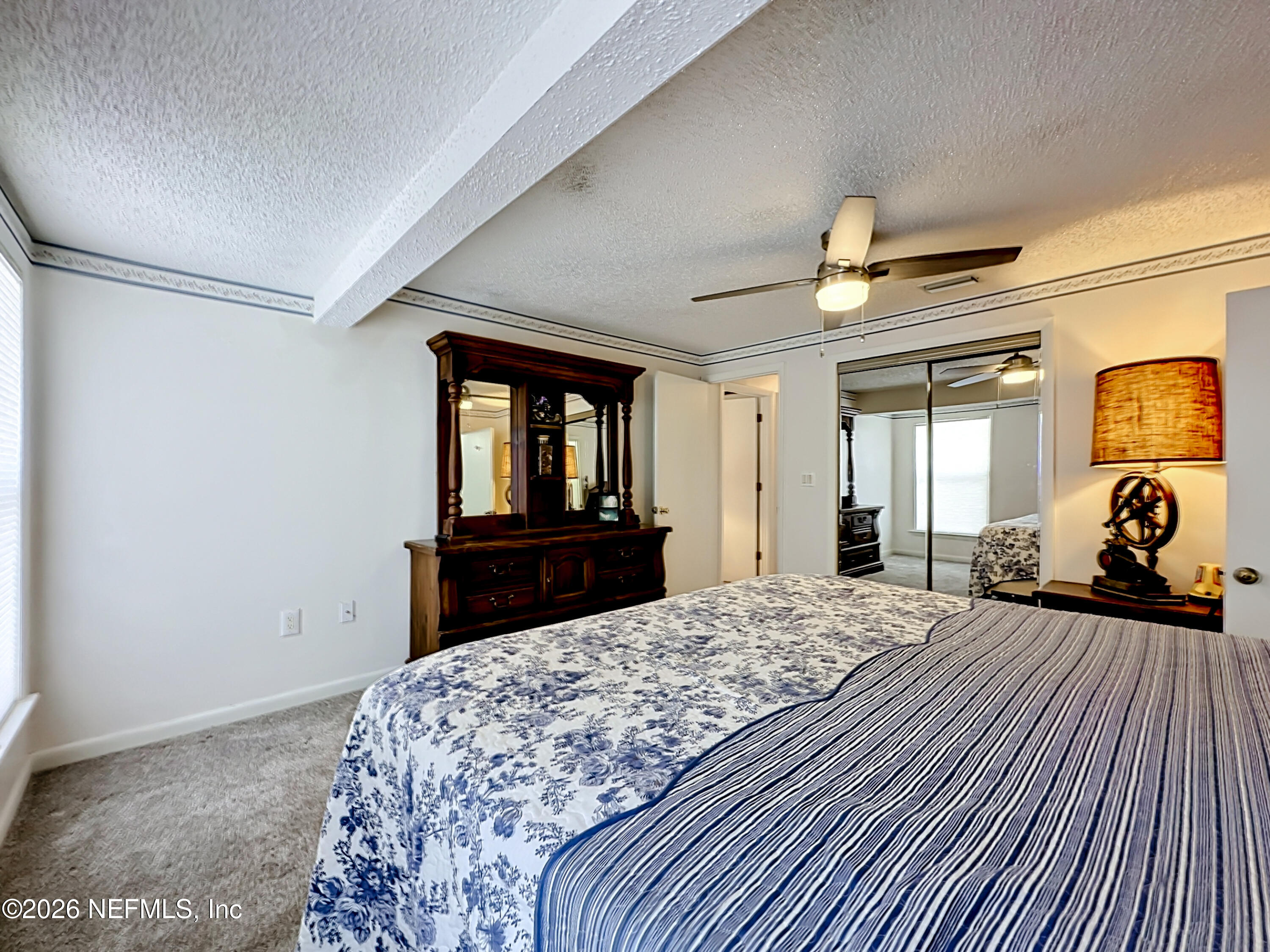 126 Pique Road Crescent City, FL 32112 - Photo 25 of 59 a bedroom with a bed and a dresser
