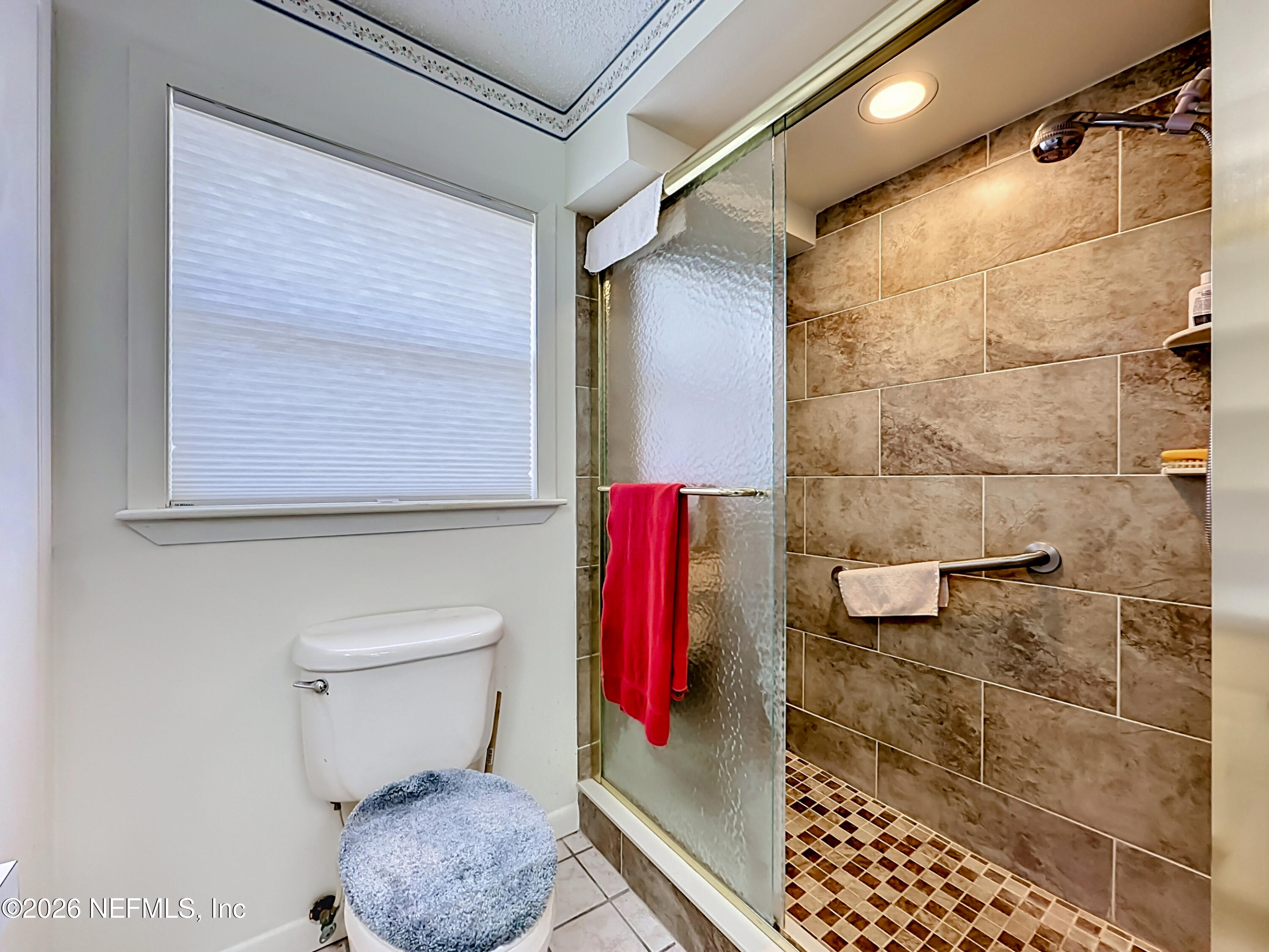 126 Pique Road Crescent City, FL 32112 - Photo 27 of 59 a bathroom with a toilet and a shower