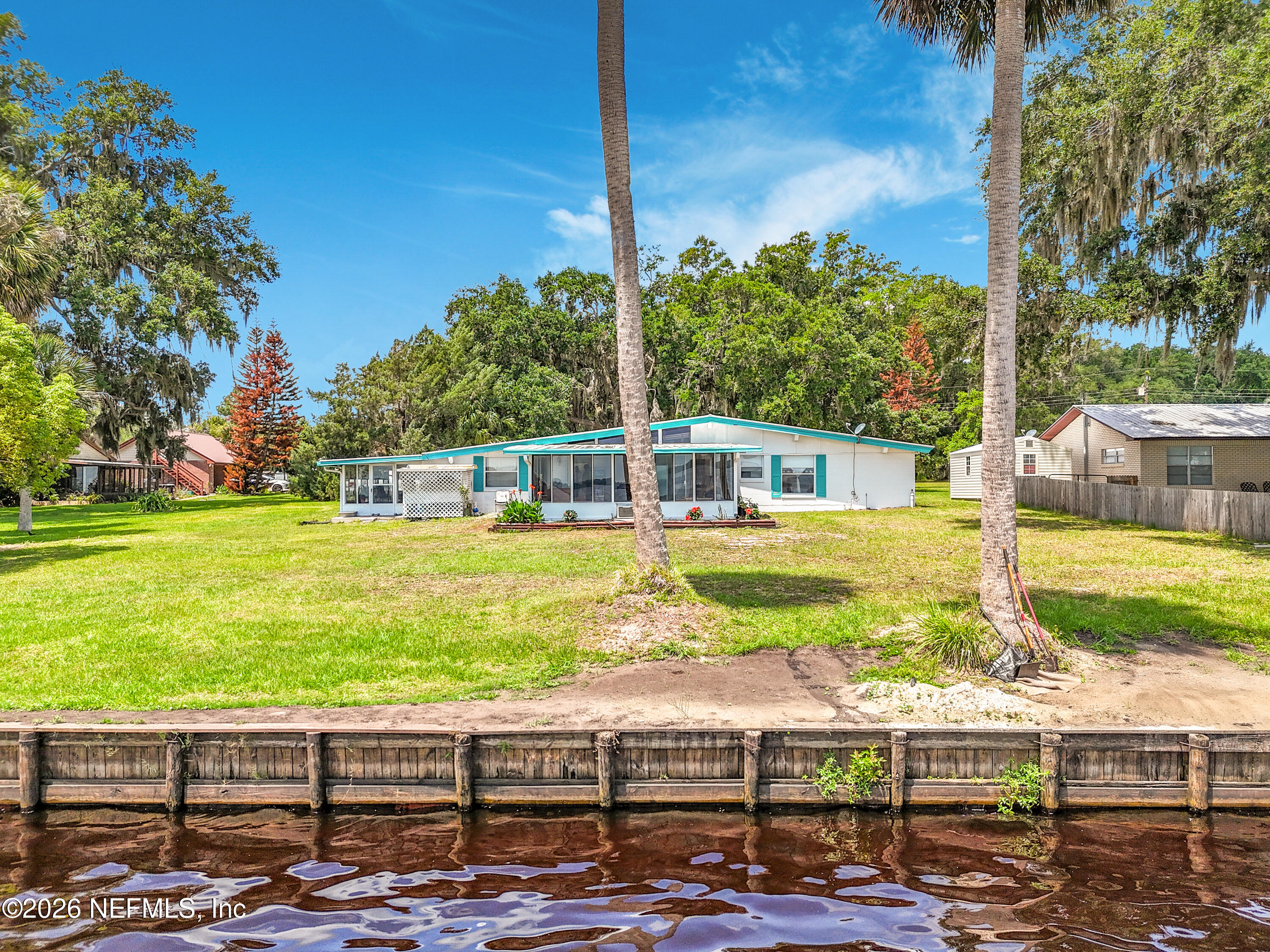 126 Pique Road Crescent City, FL 32112 - Photo 49 of 59 a view of a swimming pool with a yard