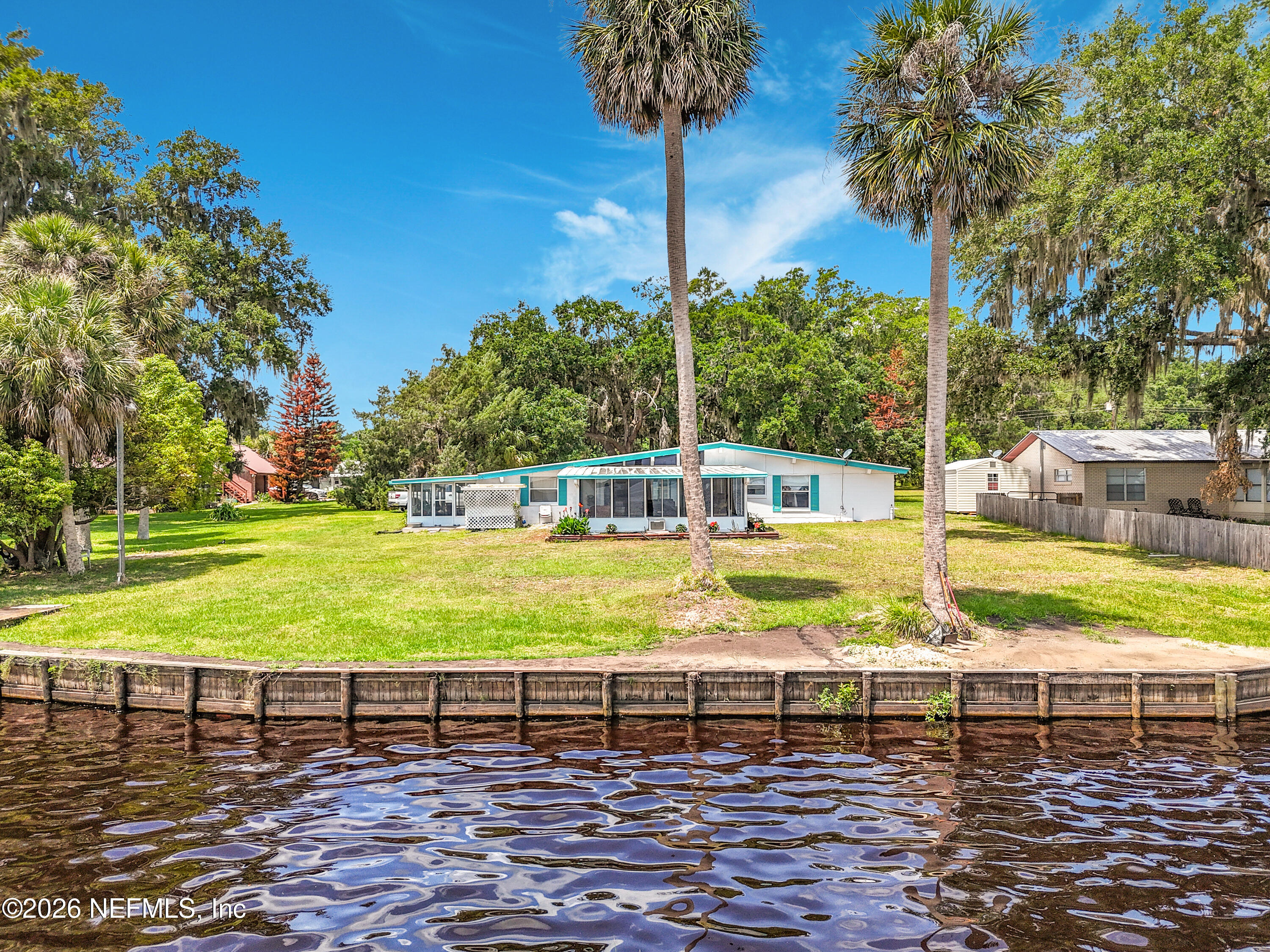 126 Pique Road Crescent City, FL 32112 - Photo 5 of 59 a view of a swimming pool with an outdoor space