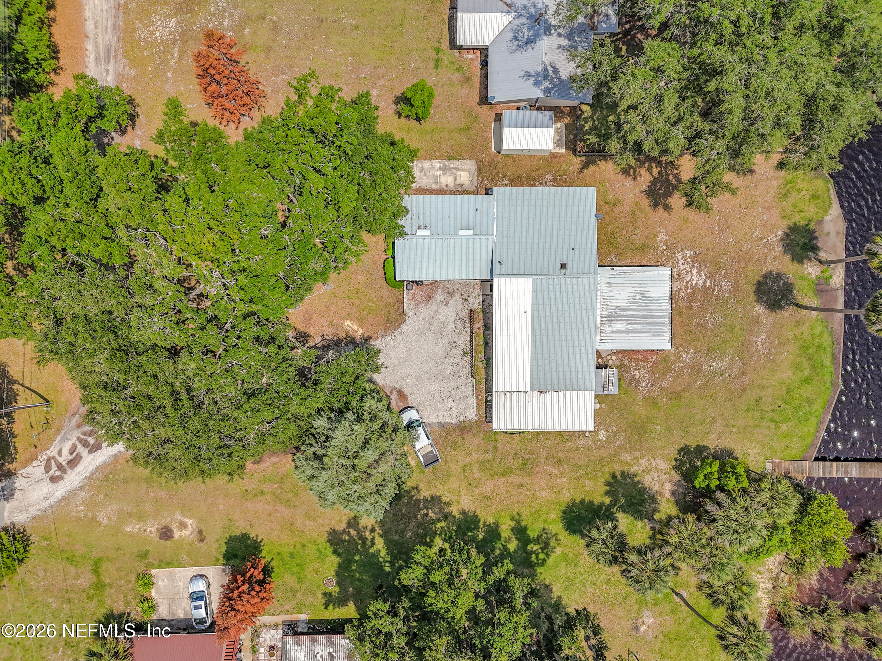 126 Pique Road Crescent City, FL 32112 - Photo 51 of 59 an aerial view of residential house with outdoor space