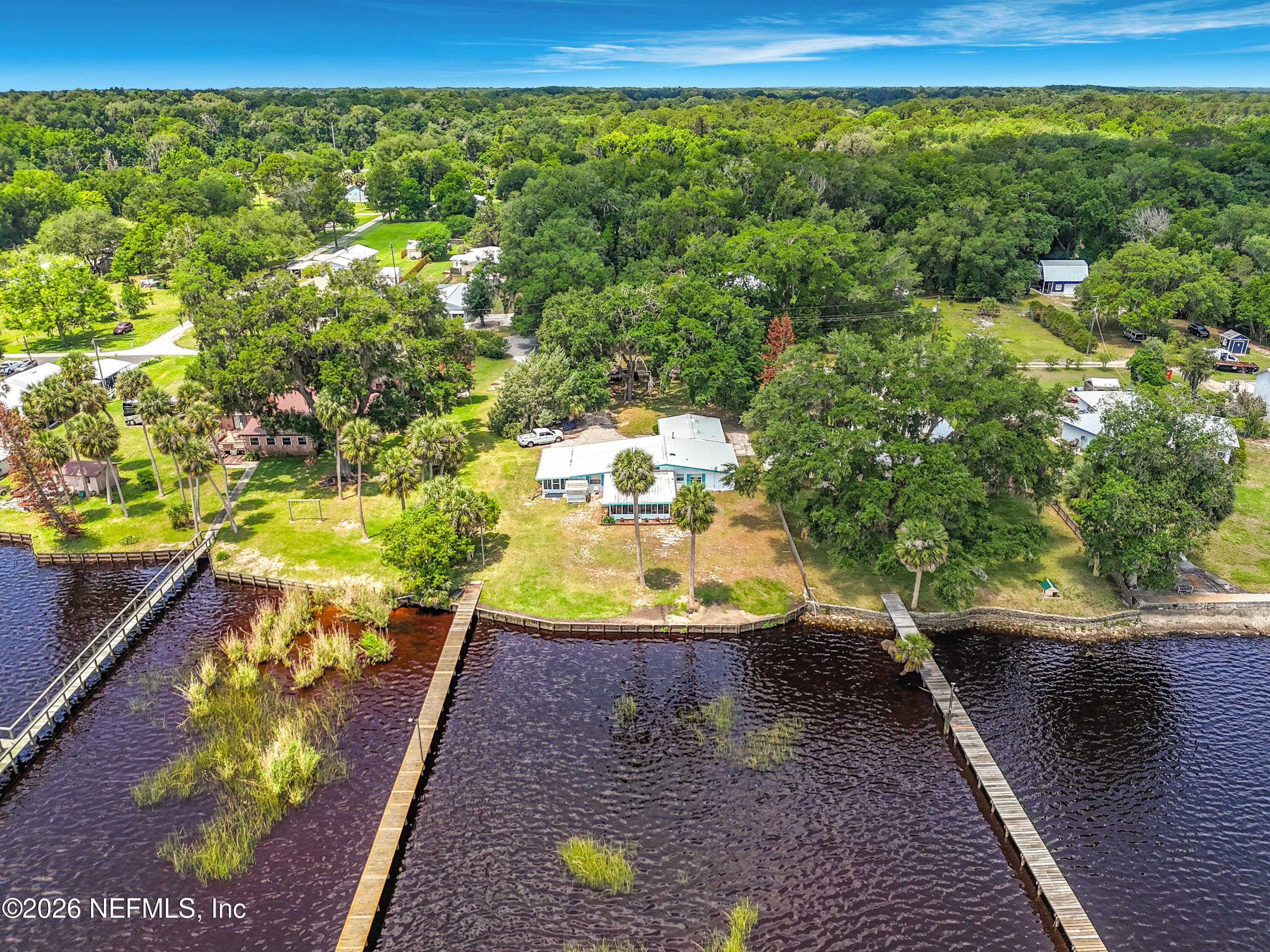 126 Pique Road Crescent City, FL 32112 - Photo 53 of 59 a view of a swimming pool with a patio