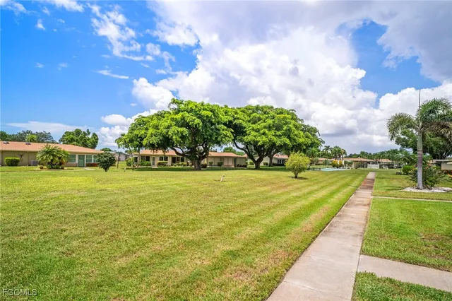 a view of an outdoor space and swimming pool