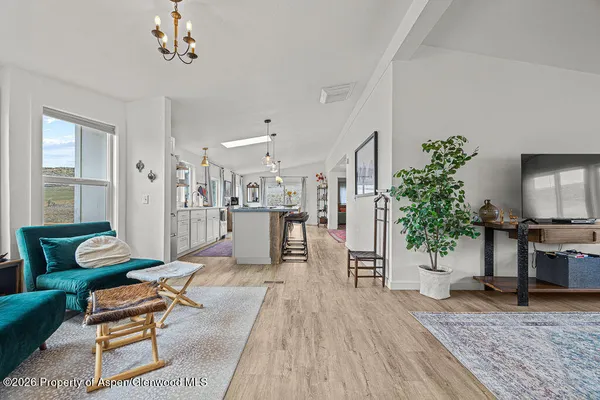 a room with furniture and wooden floor
