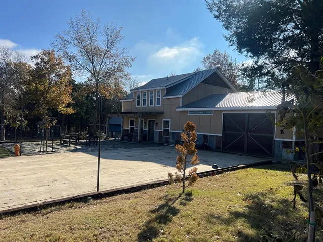 a view of a house with snow on the roof