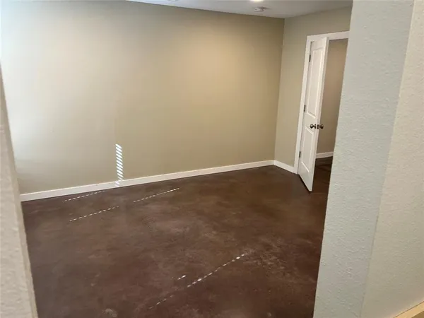 an empty room with an entryway