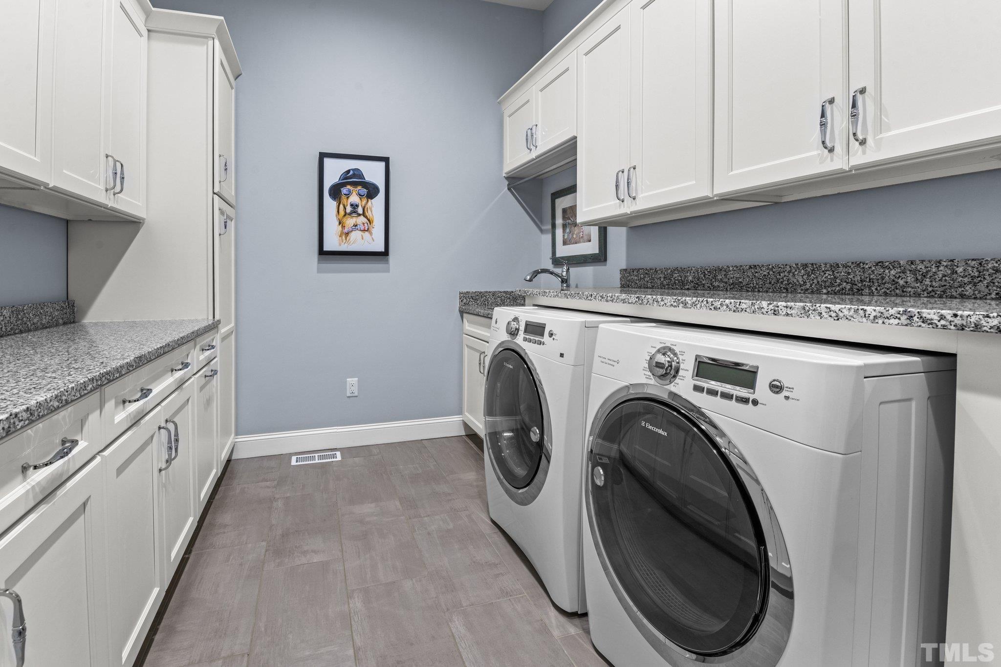 384 Colonial Ridge Drive Pittsboro, NC 27312 - Photo 15 of 47 a utility room with sink dryer and washer