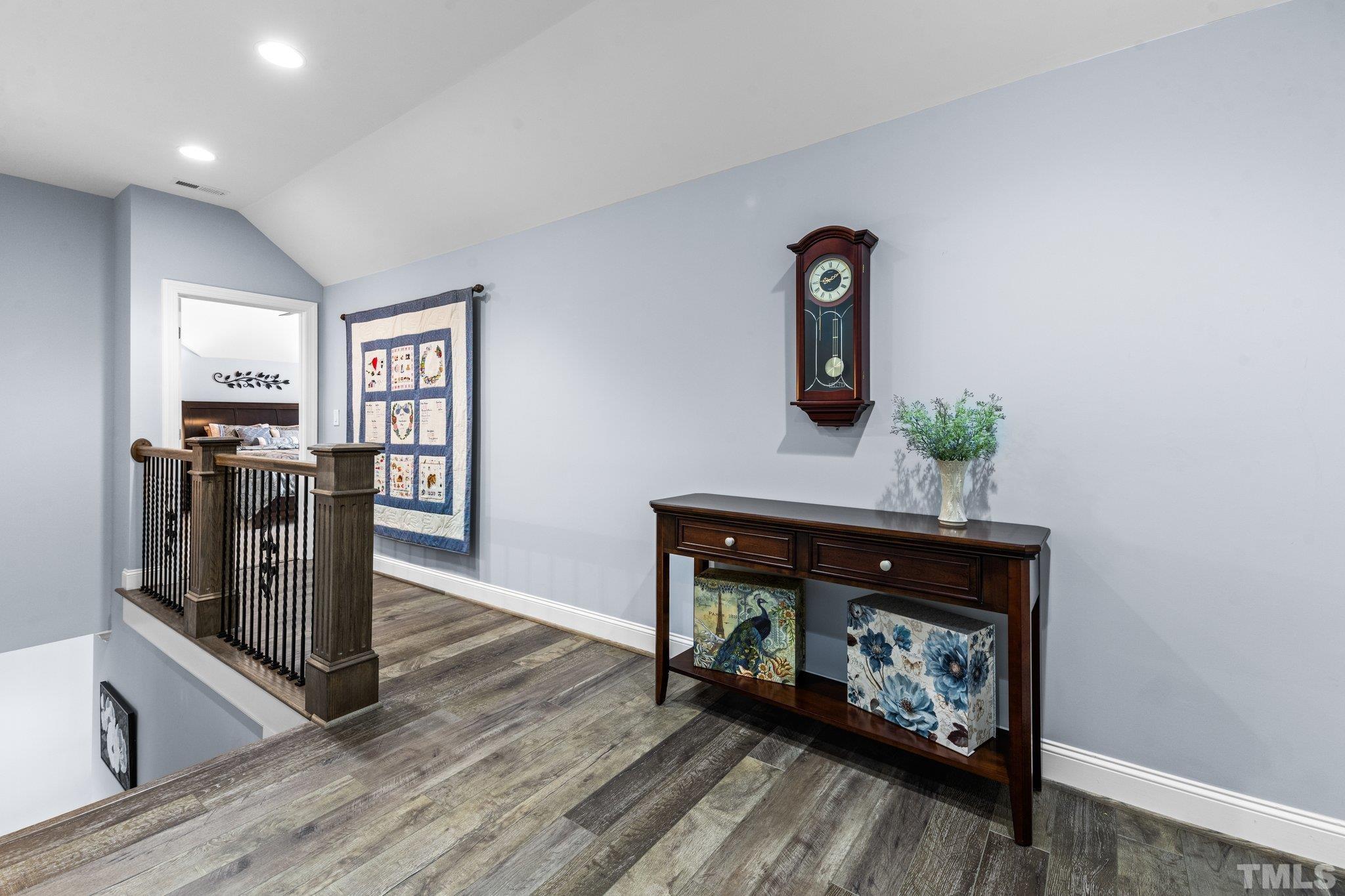 384 Colonial Ridge Drive Pittsboro, NC 27312 - Photo 23 of 47 a living room with furniture a fireplace and next to a window