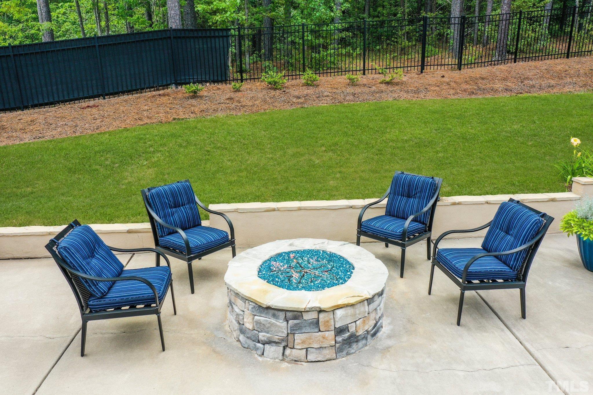 384 Colonial Ridge Drive Pittsboro, NC 27312 - Photo 27 of 47 a view of an outdoor sitting area in a yard