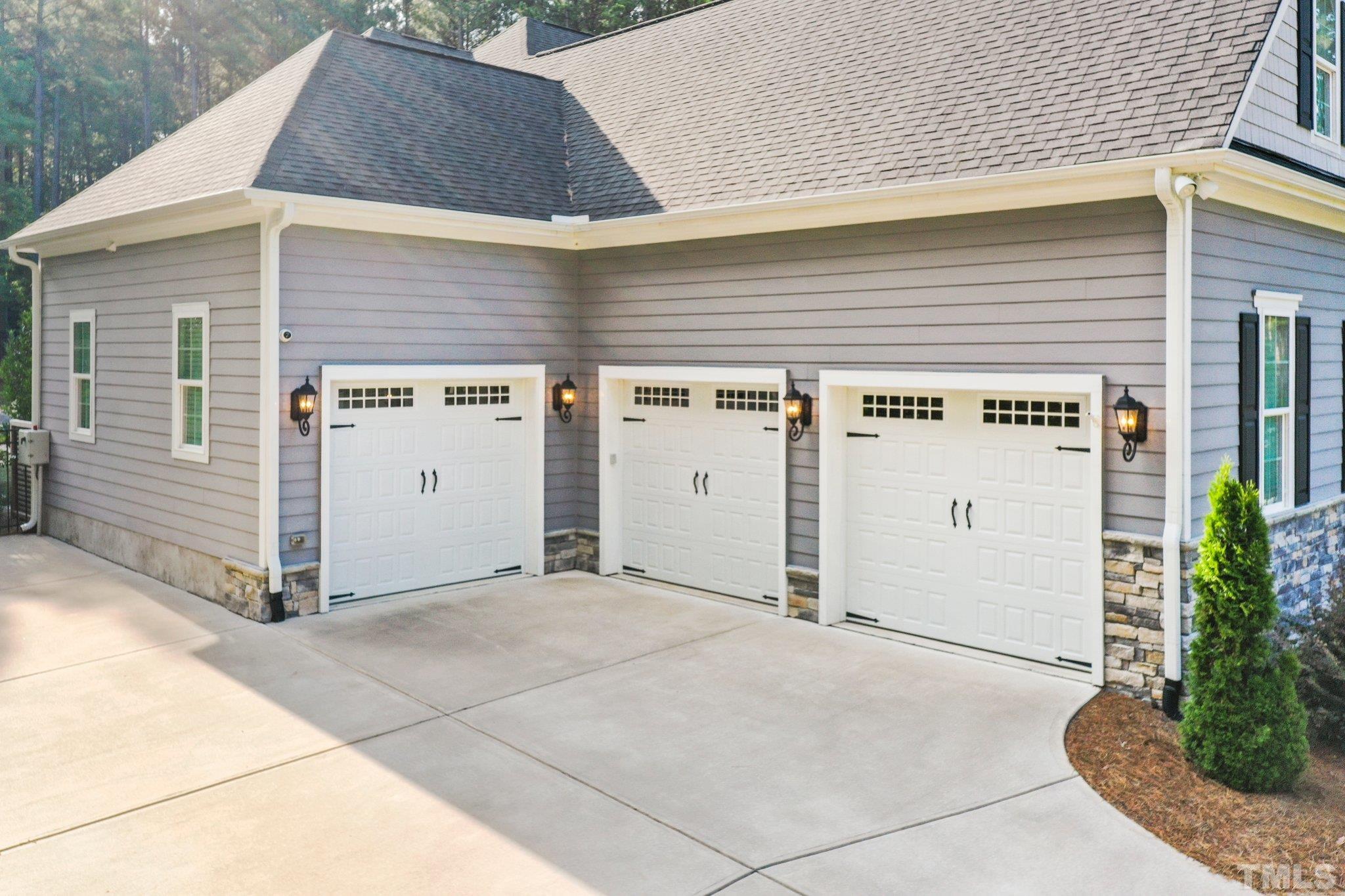 384 Colonial Ridge Drive Pittsboro, NC 27312 - Photo 42 of 47 a view of a house with garage