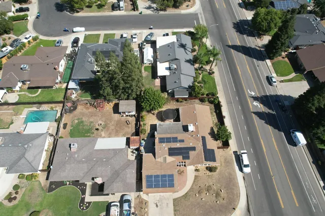 a front view of a house with swimming pool