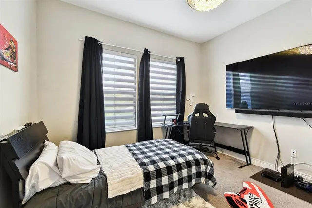 a view of a kitchen with furniture and staircase