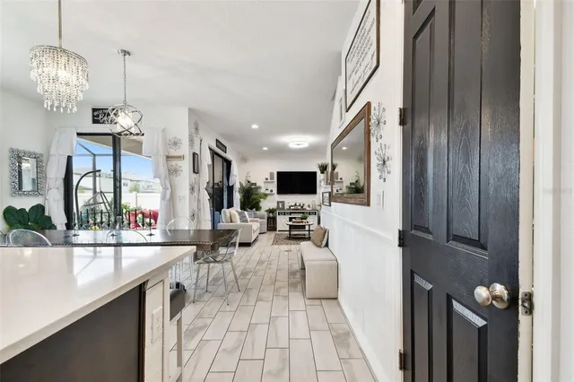 a view of walk in closet with clothes