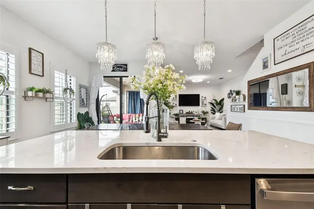 a large bathroom with a double vanity sink a mirror and a shower