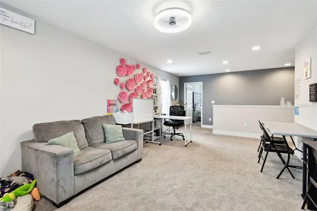 a bedroom with a bed and a cabinets