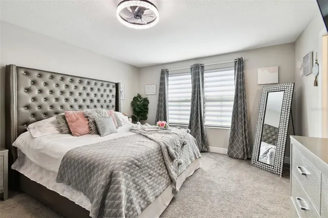 a bedroom with a bed and a closet