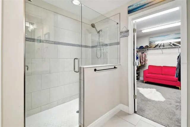 a outdoor space with patio couches and a potted plant