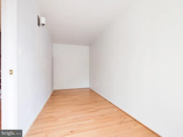 a view of a big room with wooden floor