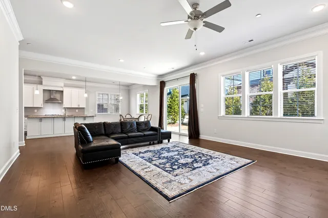 a living room with furniture and a rug