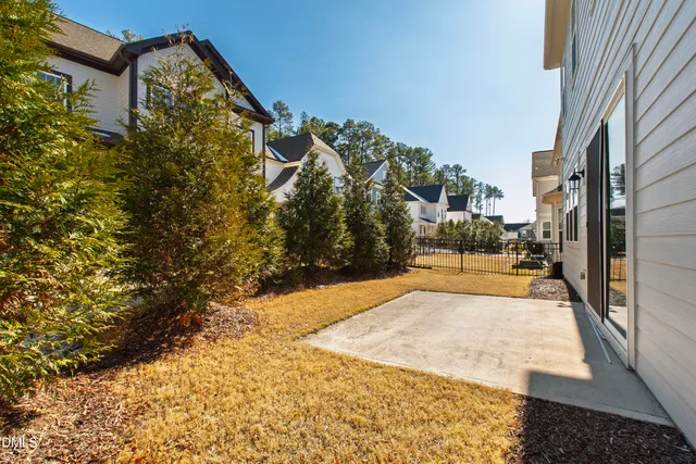 a view of swimming pool with sitting area