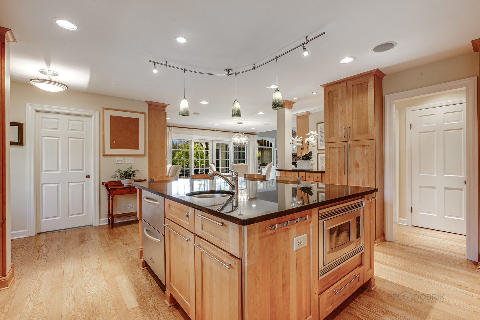 1267 West Deerpath Road Lake Forest, IL 60045 - Photo 11 of 47 a kitchen with stainless steel appliances granite countertop a sink and cabinets