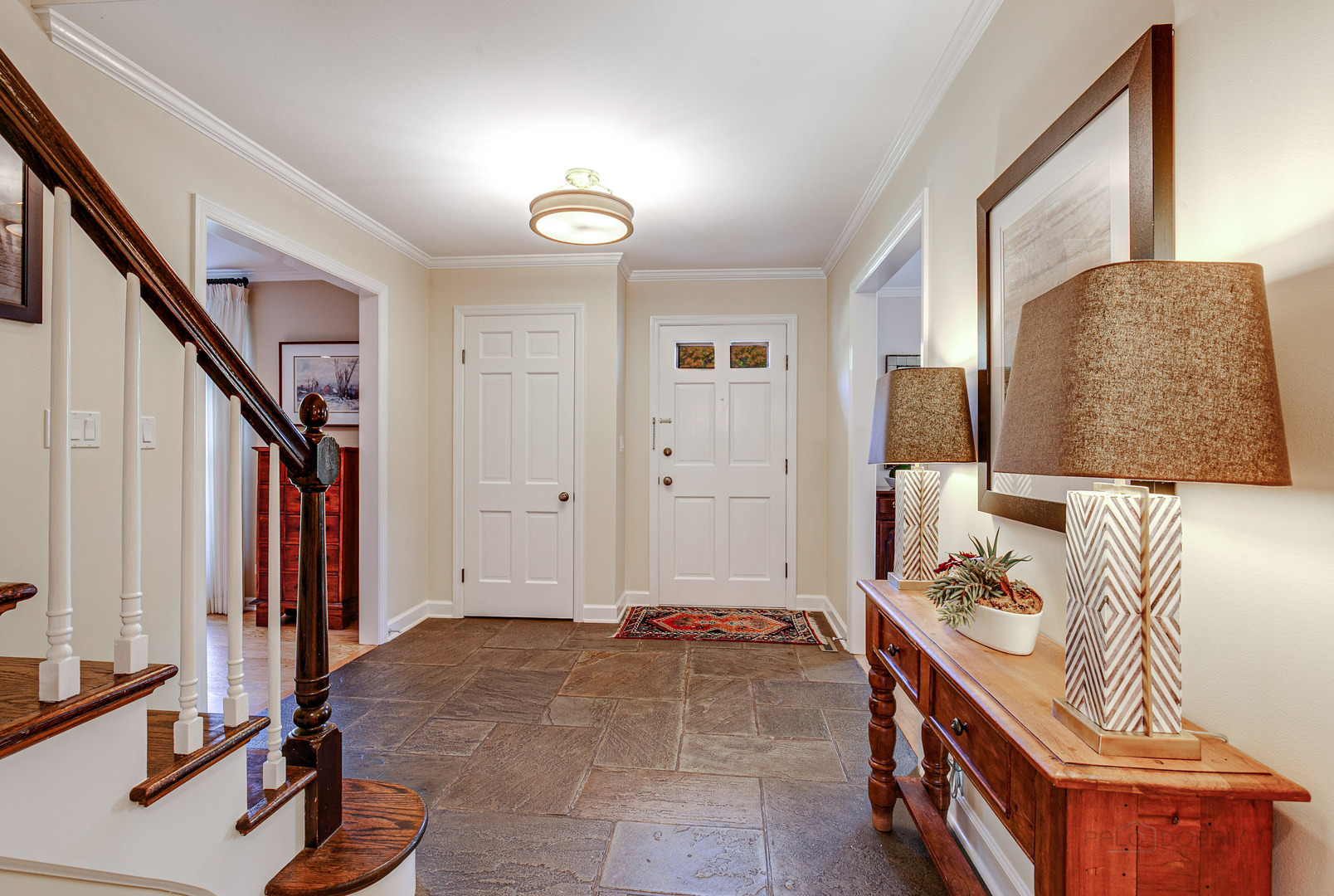 1267 West Deerpath Road Lake Forest, IL 60045 - Photo 16 of 47 a view of a hallway with furniture and a window
