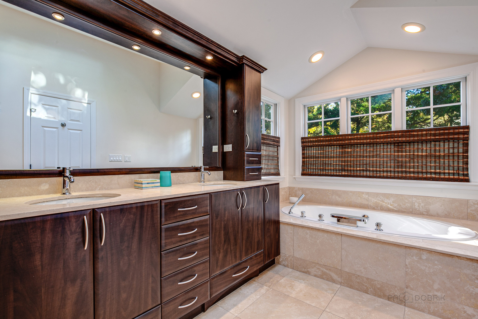 1267 West Deerpath Road Lake Forest, IL 60045 - Photo 19 of 47 a bathroom with a sink and a large mirror