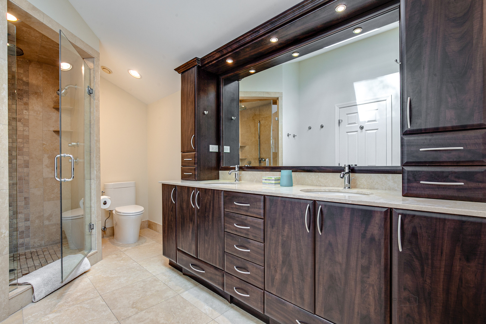 1267 West Deerpath Road Lake Forest, IL 60045 - Photo 20 of 47 a spacious bathroom with a double vanity sink toilet and shower