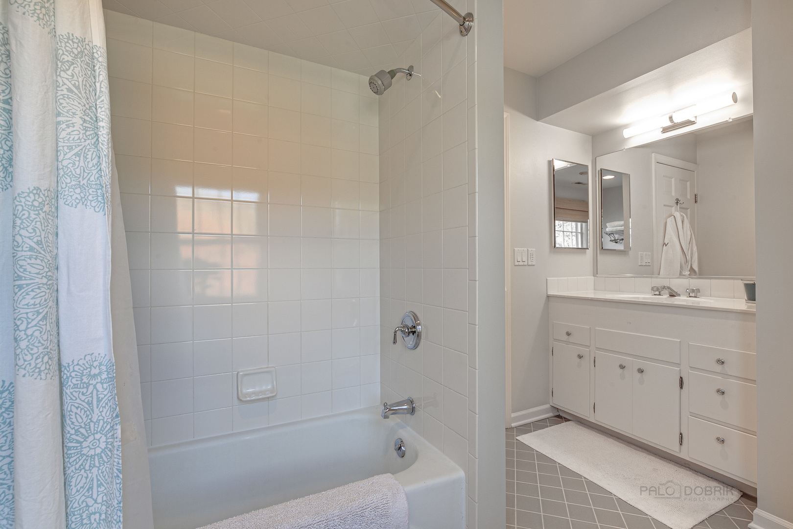1267 West Deerpath Road Lake Forest, IL 60045 - Photo 22 of 47 a bathroom with a tub sink shower and mirror