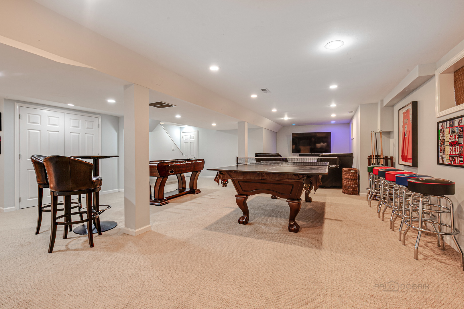 1267 West Deerpath Road Lake Forest, IL 60045 - Photo 33 of 47 a lobby with furniture and a refrigerator