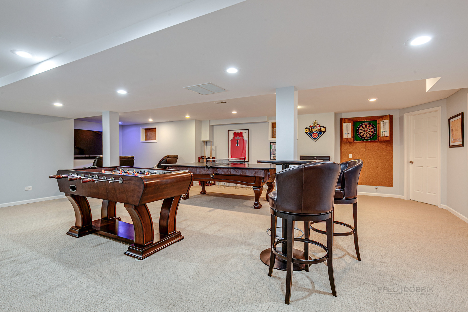 1267 West Deerpath Road Lake Forest, IL 60045 - Photo 34 of 47 a room with furniture and a flat screen tv