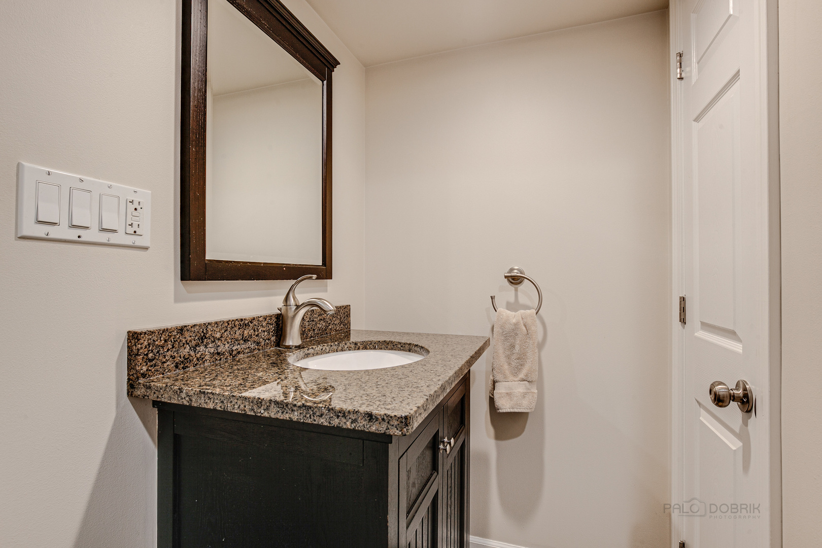 1267 West Deerpath Road Lake Forest, IL 60045 - Photo 35 of 47 a bathroom with a granite countertop sink and a mirror